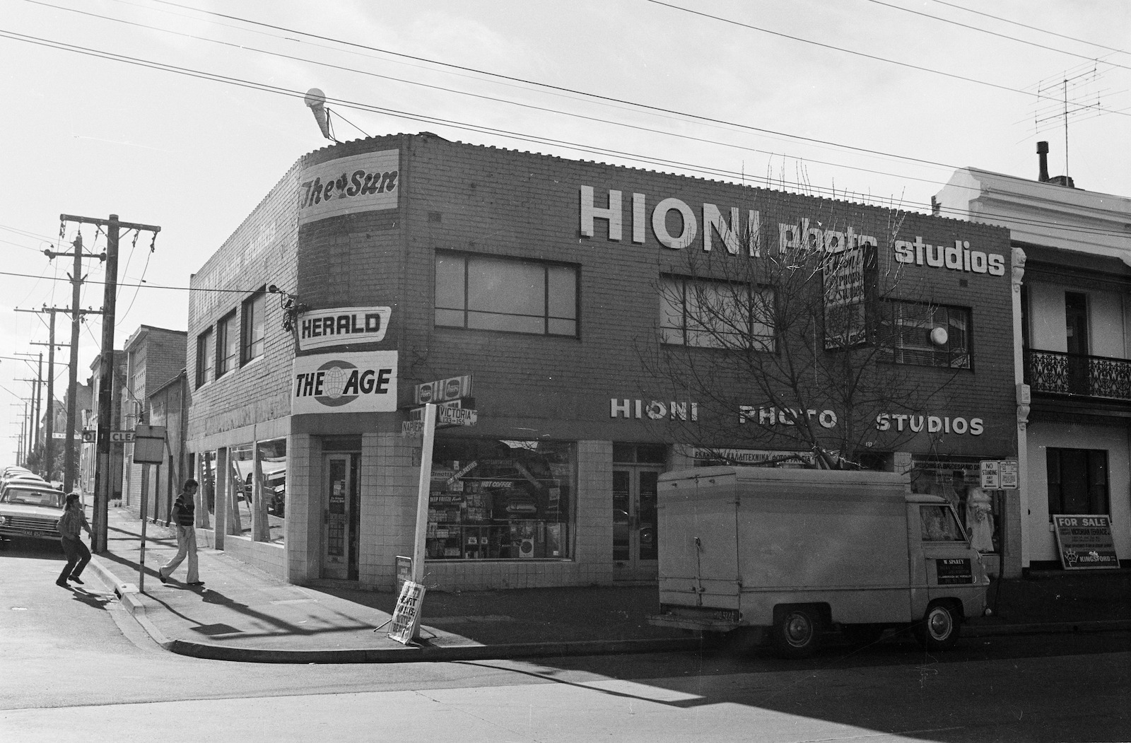 Black and white photograph depicting business premises of Hioni Photo studios