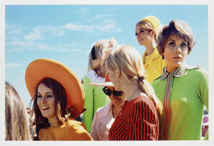 Group of six English models at the Melbourne Cup in brightly coloured clothing