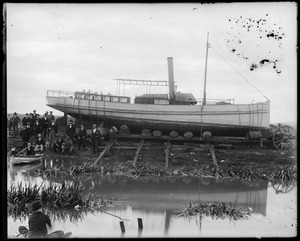 Launching of &#39;Wander[?]&#39; into creek