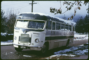 Parked J W Griffith bus with snow on the roof, at the corner of Roper and Nelson Streets, Mount Beauty